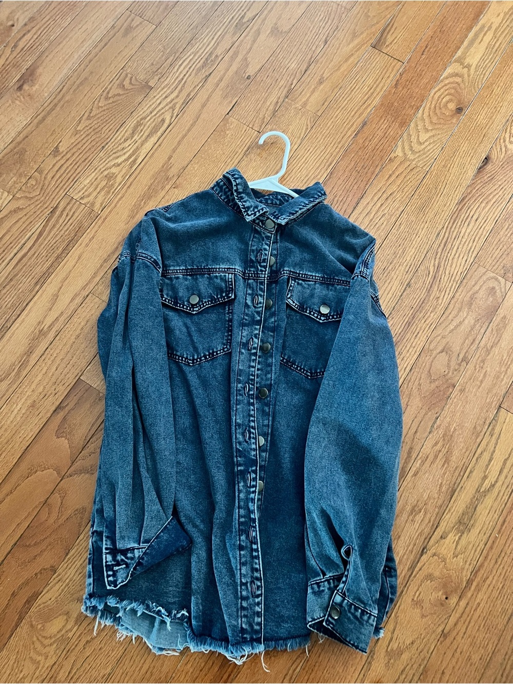 Women's Oversized Blue Denim Jacket with Distressed Hem